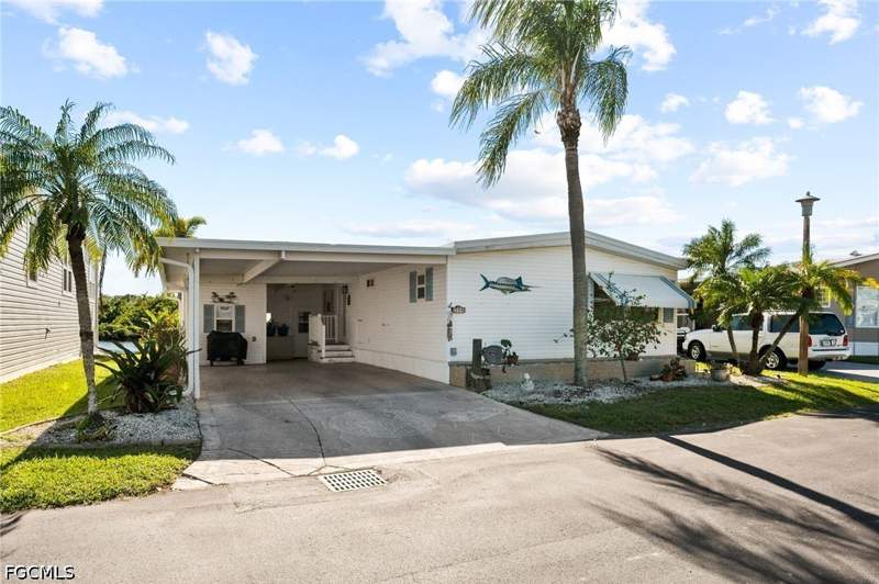 2 bedroom ManufacturedHome at 204 Sun Cir, Orange Harbor Mobile Home Park, Fort Myers — photo 2