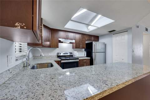 1400 Green Valley Cir 1002, Naples FL - photo 7 of 20