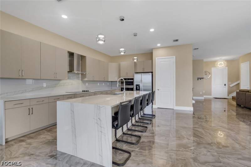 4 bedroom SingleFamilyResidence at 5074 Penella Ave, Maple Ridge, Ave Maria — photo 4