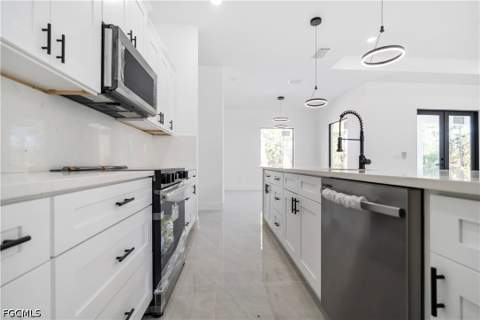 1112 Calvin Ave, Lehigh Acres FL - photo 14 of 44