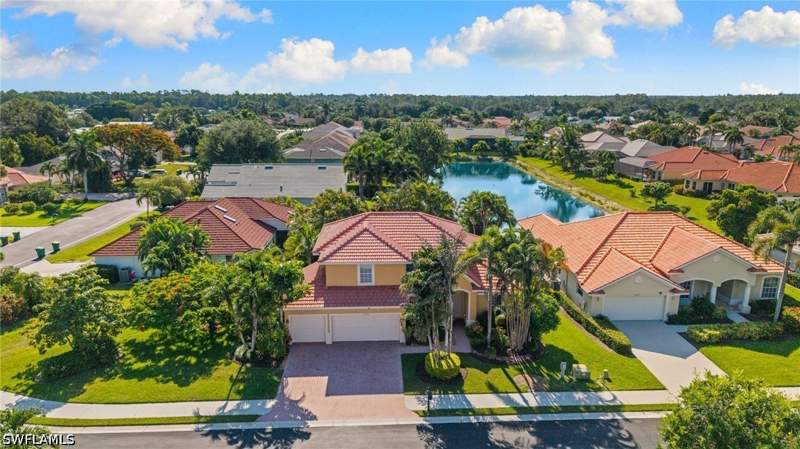 4 bedroom SingleFamilyResidence at 5005 Old Pond Dr, Moon Lake, Naples — photo 2