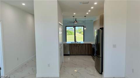 1208 NW 25th Pl, Cape Coral FL - photo 7 of 31