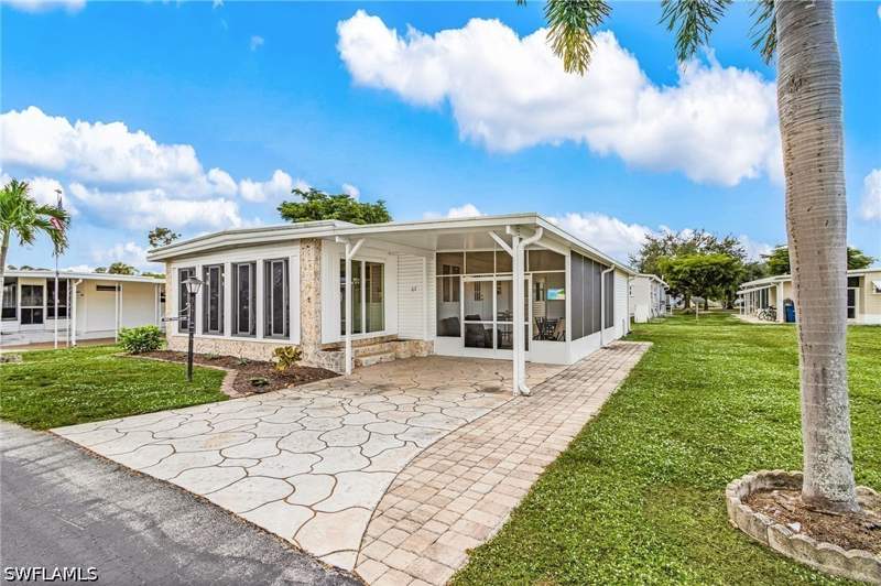 2 bedroom ManufacturedHome at 67 Sturbridge Ln, Coachlight Manor Mobile Home, Fort Myers — photo 2