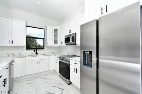 317 Lancelot Ave, Lehigh Acres FL - photo 13 of 45