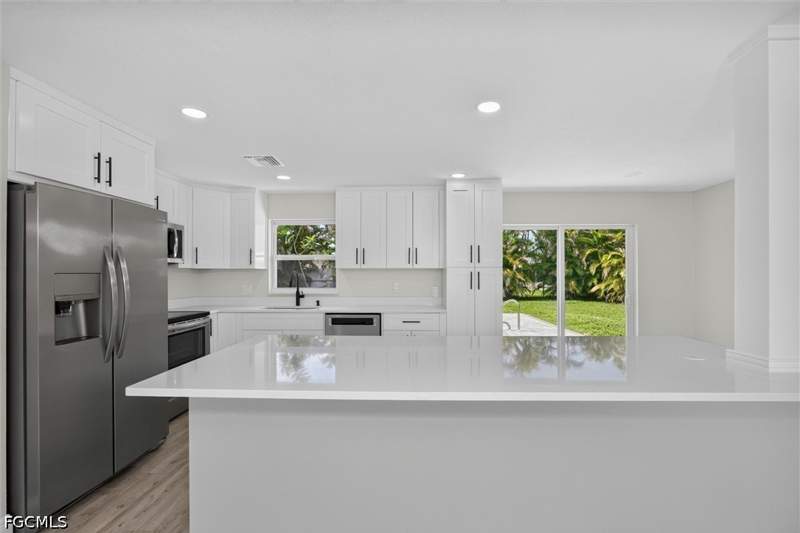 3 bedroom SingleFamilyResidence at 1628 N Flossmoor Rd, Cypress Lake Estates, Fort Myers — photo 3