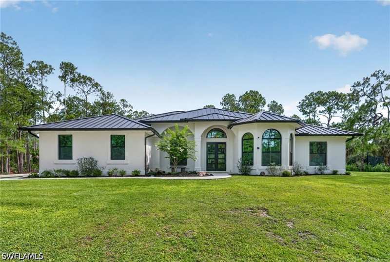 4 bedroom SingleFamilyResidence at 3521 1st Ave NW, Weber Woods, Naples — photo 1