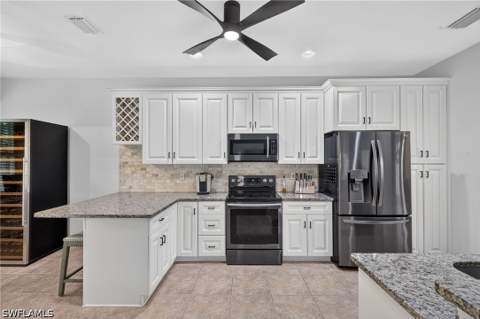 25020 Divot Dr, Bonita Springs FL - photo 10 of 41