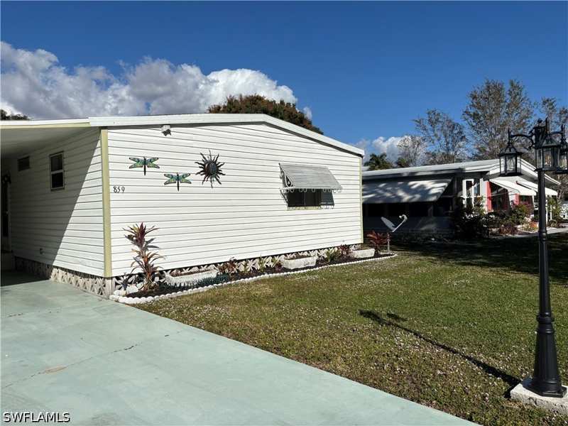 2 bedroom ManufacturedHome at 859 Manatee Rd, Riverwood, Naples — photo 1