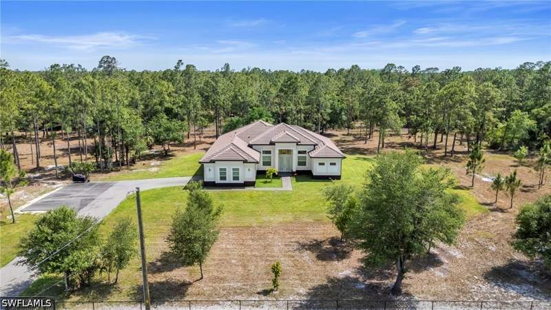 4 bedroom SingleFamilyResidence at 3026 64th Ave NE, Golden Gate Estates, Naples — photo 3