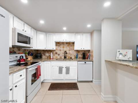 151 Cypress Way E E101, Naples FL - photo 11 of 26
