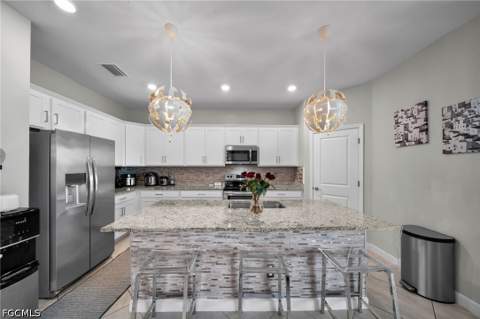 13846 Pine Lodge Ln, Fort Myers FL - photo 7 of 44
