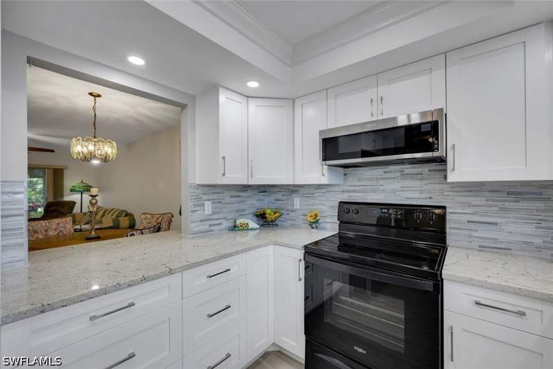 2 bedroom Condominium at 5419 Rattlesnake Hamm Rd 105F, Country Club Manor, Naples — photo 4