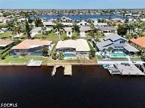 3 bedroom SingleFamilyResidence at 702 SW 52nd St, Cape Coral, Cape Coral — photo 1