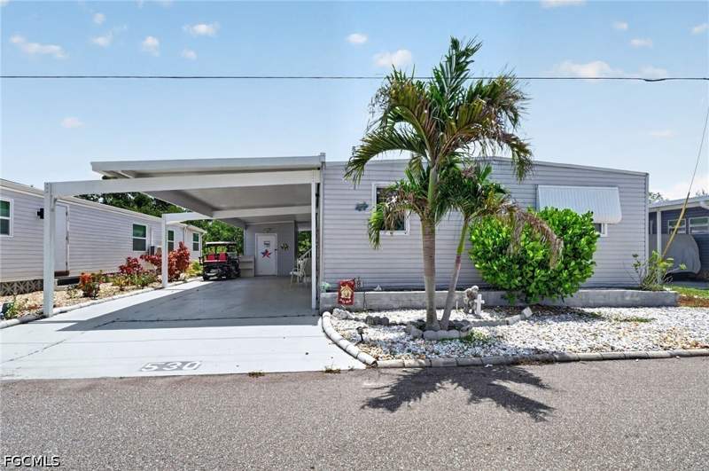 2 bedroom ManufacturedHome at 14633 Paul Revere Loop, Old Bridge Village, North Fort Myers — photo 2