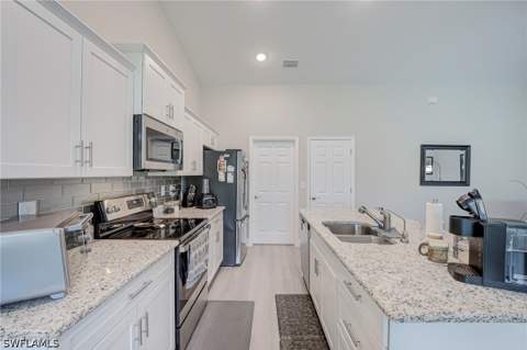 611 Truman Ave, Lehigh Acres FL - photo 10 of 35