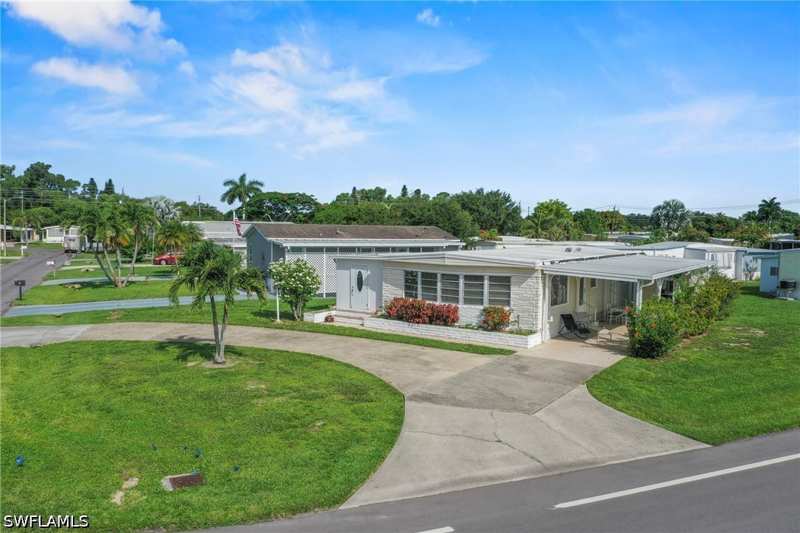 2 bedroom ManufacturedHome at 1 Cannes Dr, Riviera Colony, Naples — photo 1