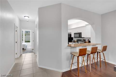 1320 Charleston Square Dr 103, Naples FL - photo 17 of 47