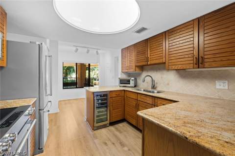 6710 Pelican Bay Blvd 422, Naples FL - photo 6 of 47