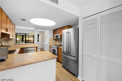 6710 Pelican Bay Blvd 422, Naples FL - photo 7 of 47