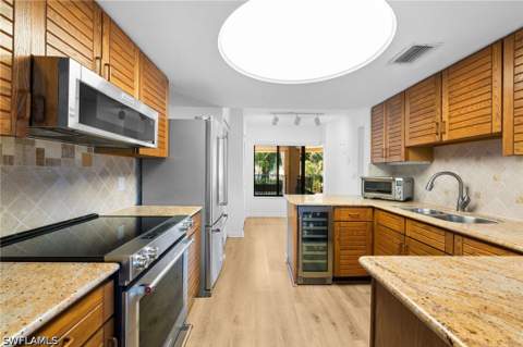 6710 Pelican Bay Blvd 422, Naples FL - photo 9 of 47