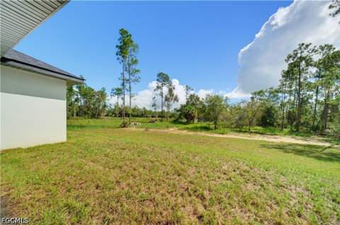 1318 Roosevelt Ave, Lehigh Acres FL - photo 10 of 60