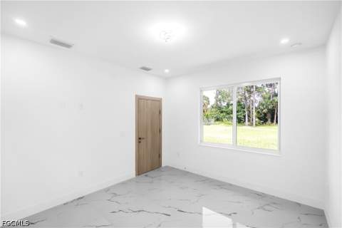 718 Robert Ave, Lehigh Acres FL - photo 13 of 32