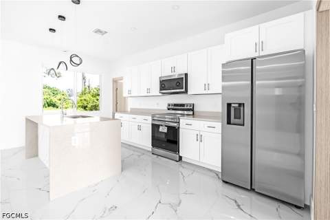 718 Robert Ave, Lehigh Acres FL - photo 8 of 32