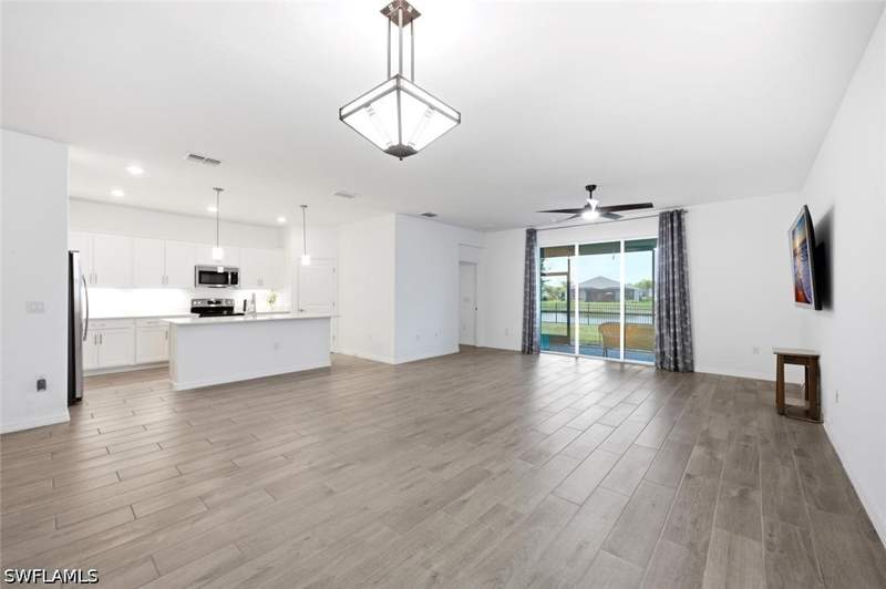 4 bedroom SingleFamilyResidence at 2294 Avocado Ln, The Groves At Orange Blossom Ranch, Naples — photo 5