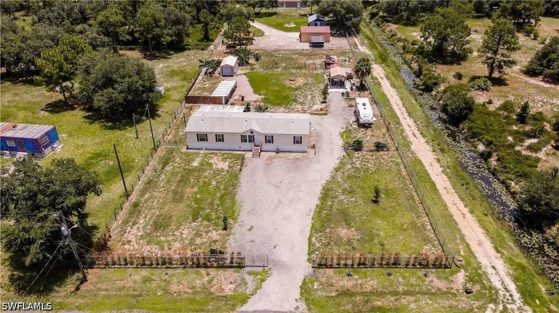 4 bedroom ManufacturedHome at 585 S Lindero St, Montura Ranch Estates, Clewiston — photo 3
