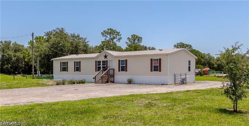 4 bedroom ManufacturedHome at 585 S Lindero St, Montura Ranch Estates, Clewiston — photo 4
