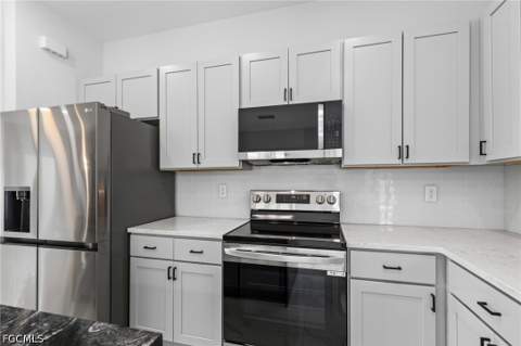 3921 NW 40th Ln, Cape Coral FL - photo 9 of 34