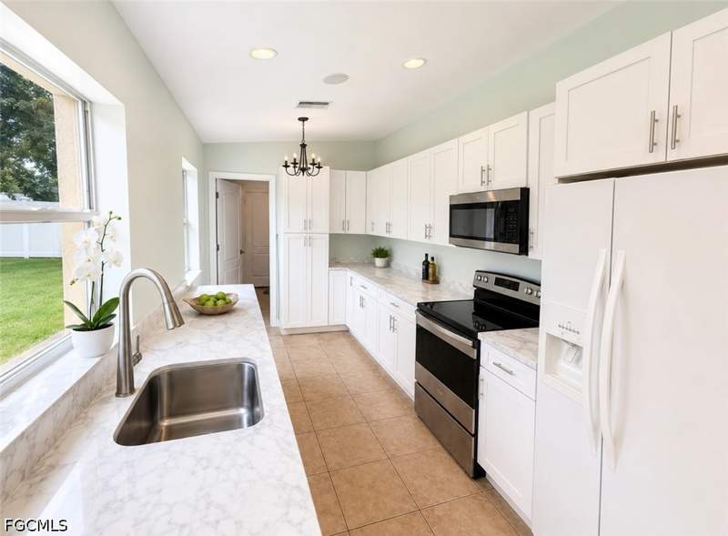 3 bedroom SingleFamilyResidence at 416 Candlewick Cir S, Parkwood, Lehigh Acres — photo 4