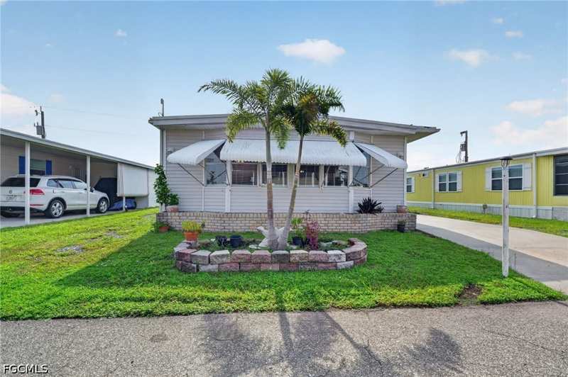 2 bedroom ManufacturedHome at 14716 Nantucket Rd 411, Old Bridge Village, North Fort Myers — photo 1
