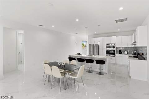 1030 NW 39th Ave, Cape Coral FL - photo 7 of 39