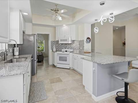 8706 Ferrara Ct, Naples FL - photo 10 of 31