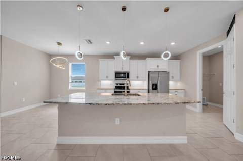 838 NW 2nd St, Cape Coral FL - photo 10 of 29