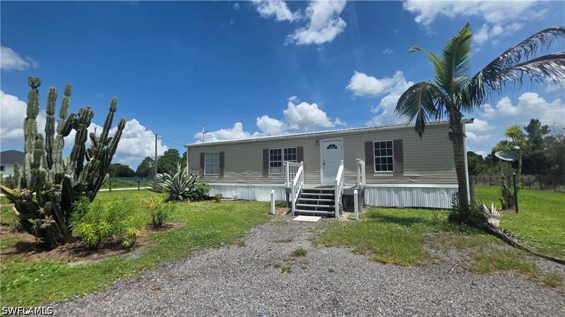3 bedroom ManufacturedHome at 451 Bald Cypress Ave, Montura Ranch Estates, Clewiston — photo 2