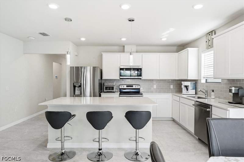 4 bedroom SingleFamilyResidence at 10761 Firebush Cir, Enclaves At Eagle Landing, North Fort Myers — photo 2