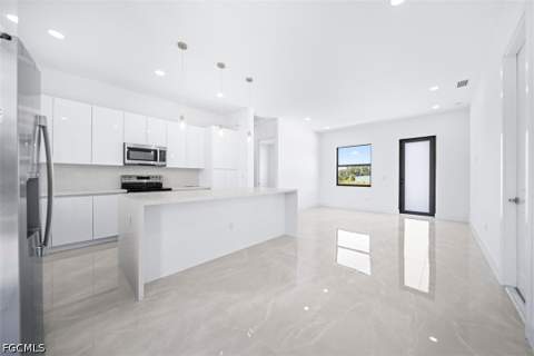 1255 Nimitz Blvd, Lehigh Acres FL - photo 11 of 26