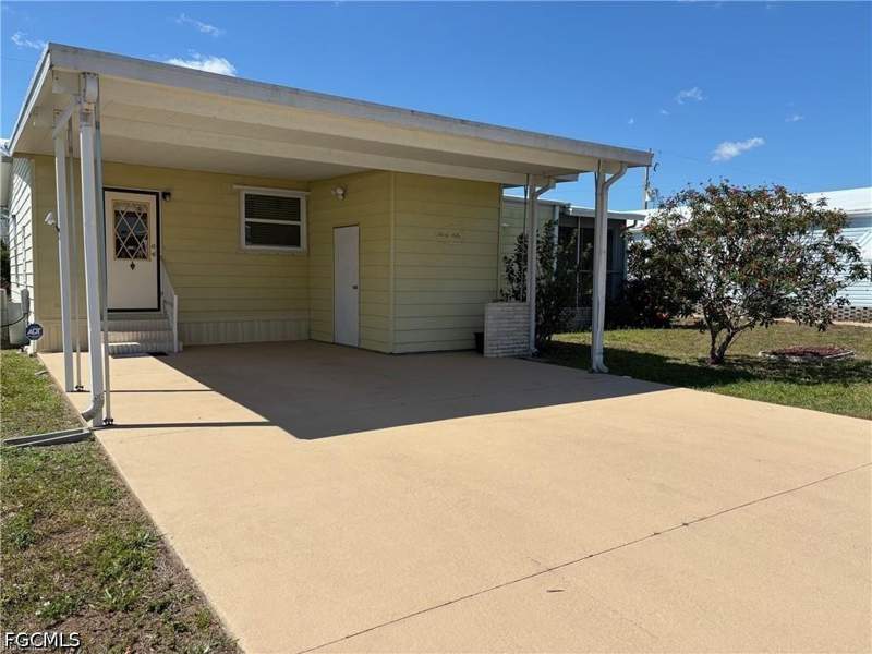 2 bedroom ManufacturedHome at 3050 Rain Dance Ln, Lake Arrowhead Mob Village, North Fort Myers — photo 2