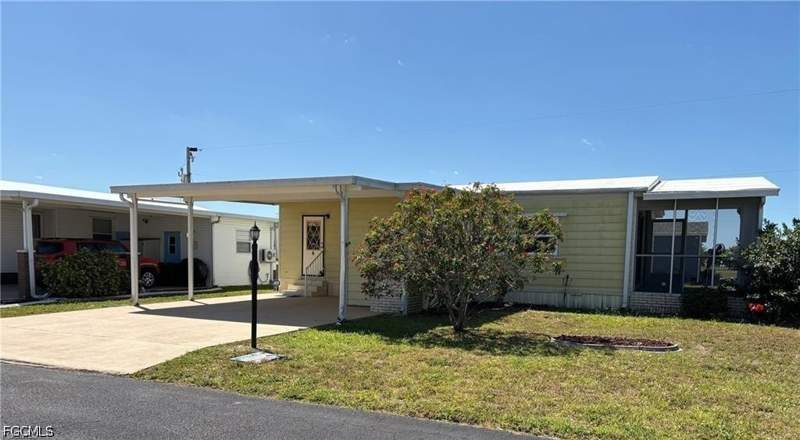 2 bedroom ManufacturedHome at 3050 Rain Dance Ln, Lake Arrowhead Mob Village, North Fort Myers — photo 3