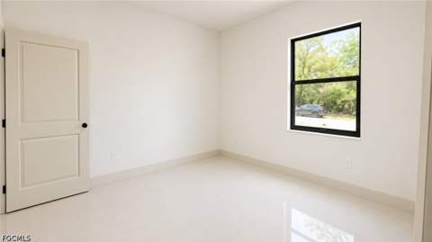 703 Long Island St E, Lehigh Acres FL - photo 8 of 18