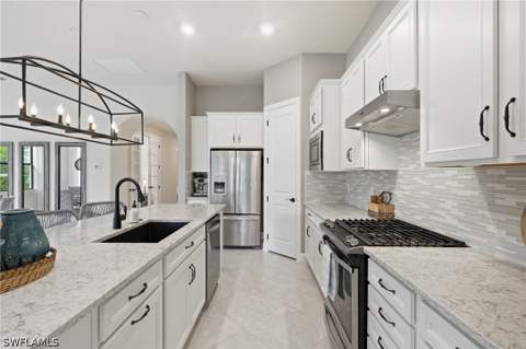 8877 Horned Lark Dr, Naples FL - photo 13 of 50
