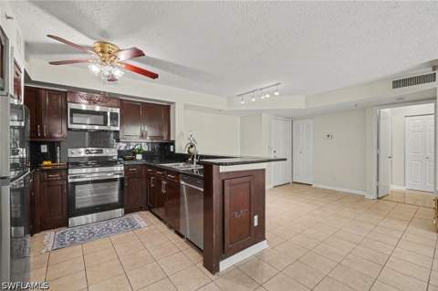 1280 Wildwood Lakes Blvd 106, Naples FL - photo 11 of 25
