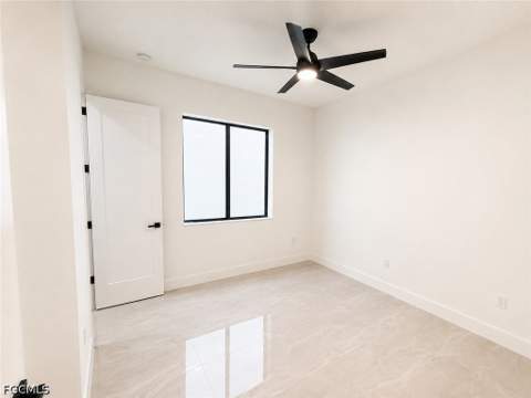 447 Rathburn St, Lehigh Acres FL - photo 8 of 37