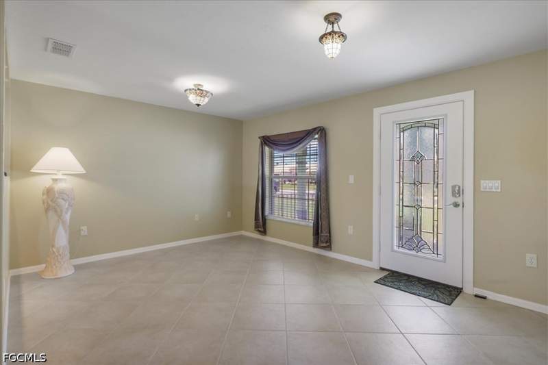3 bedroom SingleFamilyResidence at 8141 Liriope Loop, Town Lakes, Lehigh Acres — photo 2