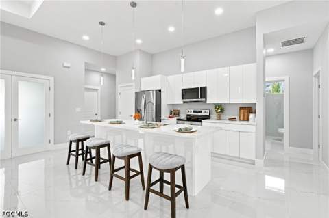 350 Radford Ave, Lehigh Acres FL - photo 6 of 40