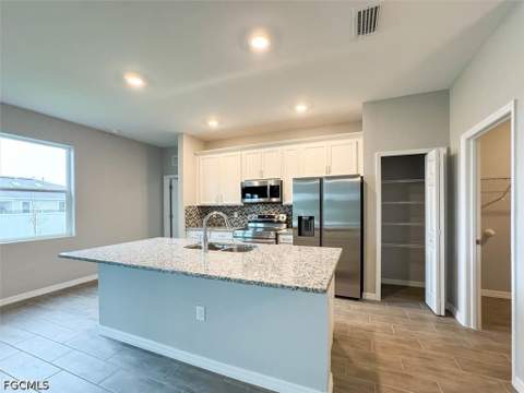 512 NW 25th Ave, Cape Coral FL - photo 11 of 42