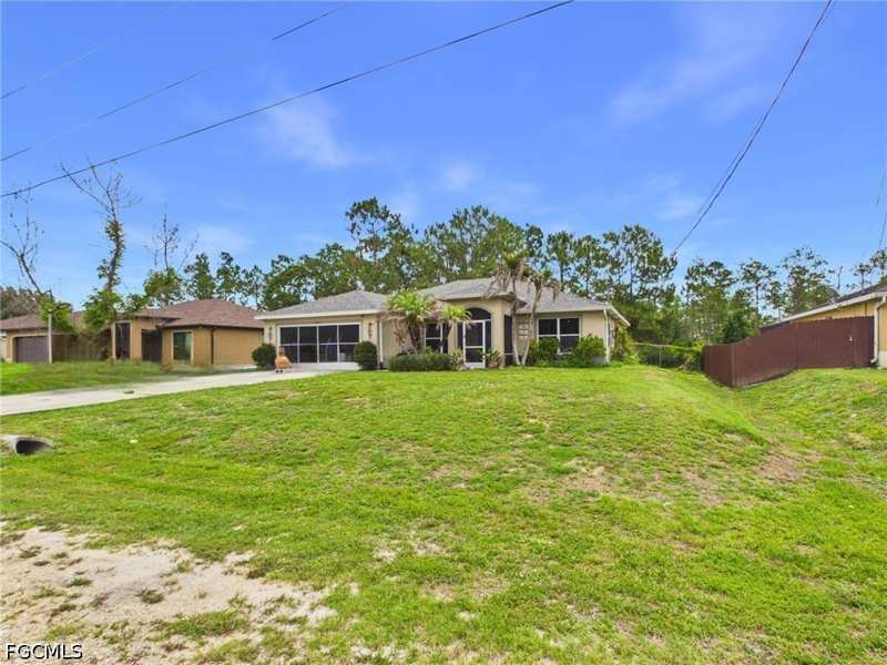 4 bedroom SingleFamilyResidence at 1858 Marlboro Ln, Greenbriar, Lehigh Acres — photo 1