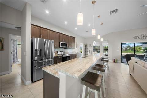 3716 SW 11th Pl, Cape Coral FL - photo 9 of 46